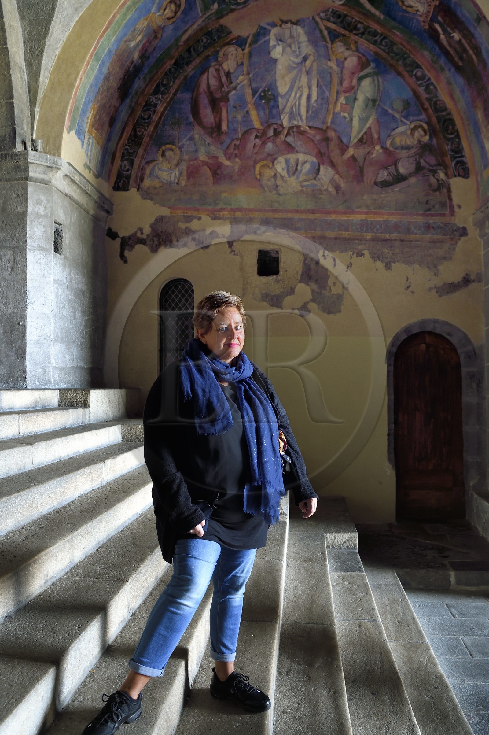 France, Haute Loire, Le Puy en Velay, the 12th century Our Lady (Notre-Dame-de-l'Annunciation) cathedral listed as World heritage by UNESCO, Annalisa Odoardi, restorer of works of art who works on the works of the cathedral in front of Saint-Martin underground side chapel under the porch