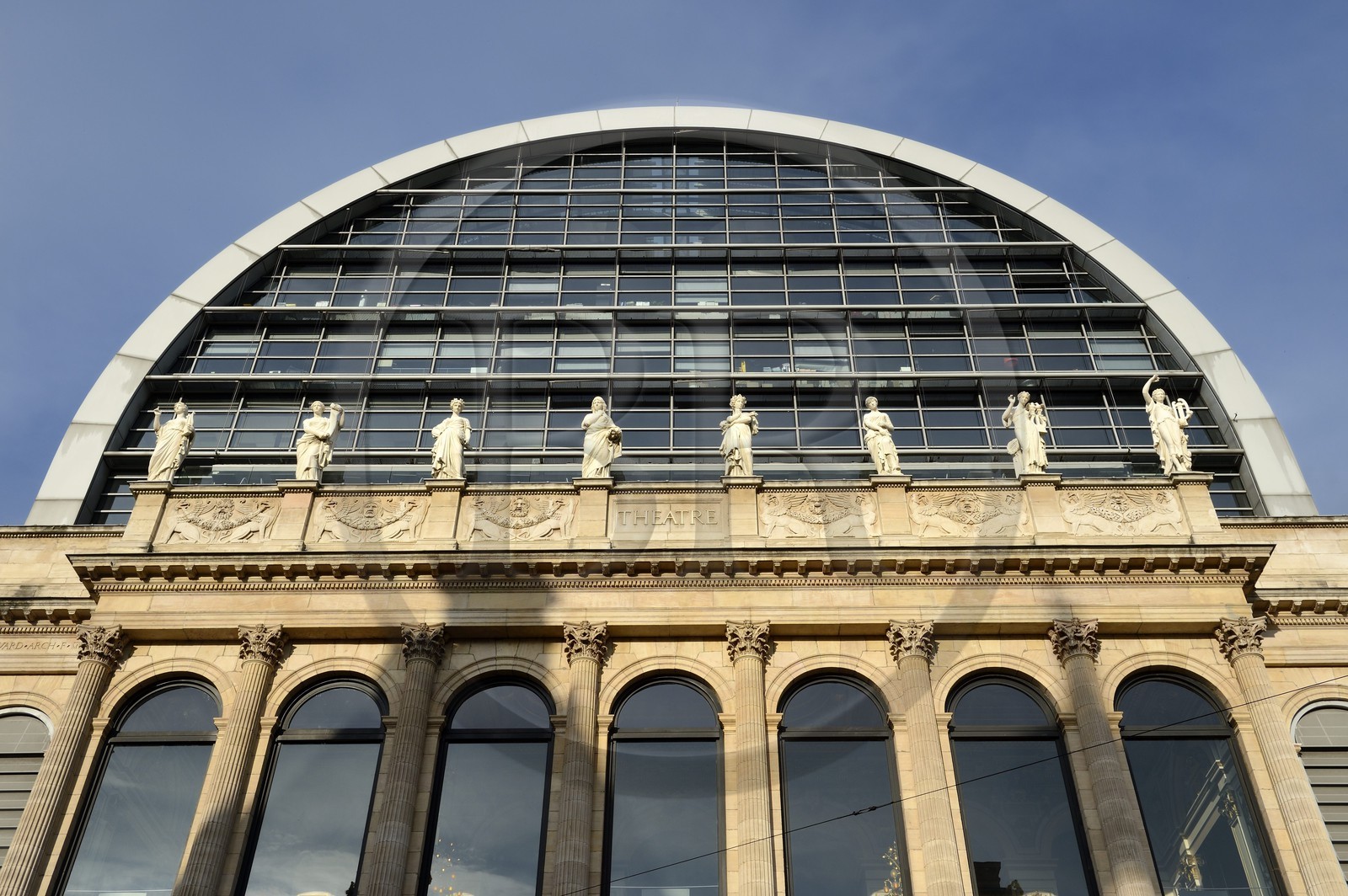 France, Rhone, Lyon, historic site listed as World Heritage by UNESCO, front of the building of the Opera de Lyon designed by architect Jean Nouvel, the Muses of the pediment