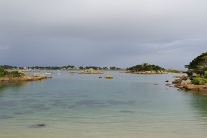 France, Cotes-d'Armor, Cote de Granit Rose (the Pink Granite coast), Tregastel, Costaeres castle and island behind St Guirec beach at Ploumanach, Renote island is in the background