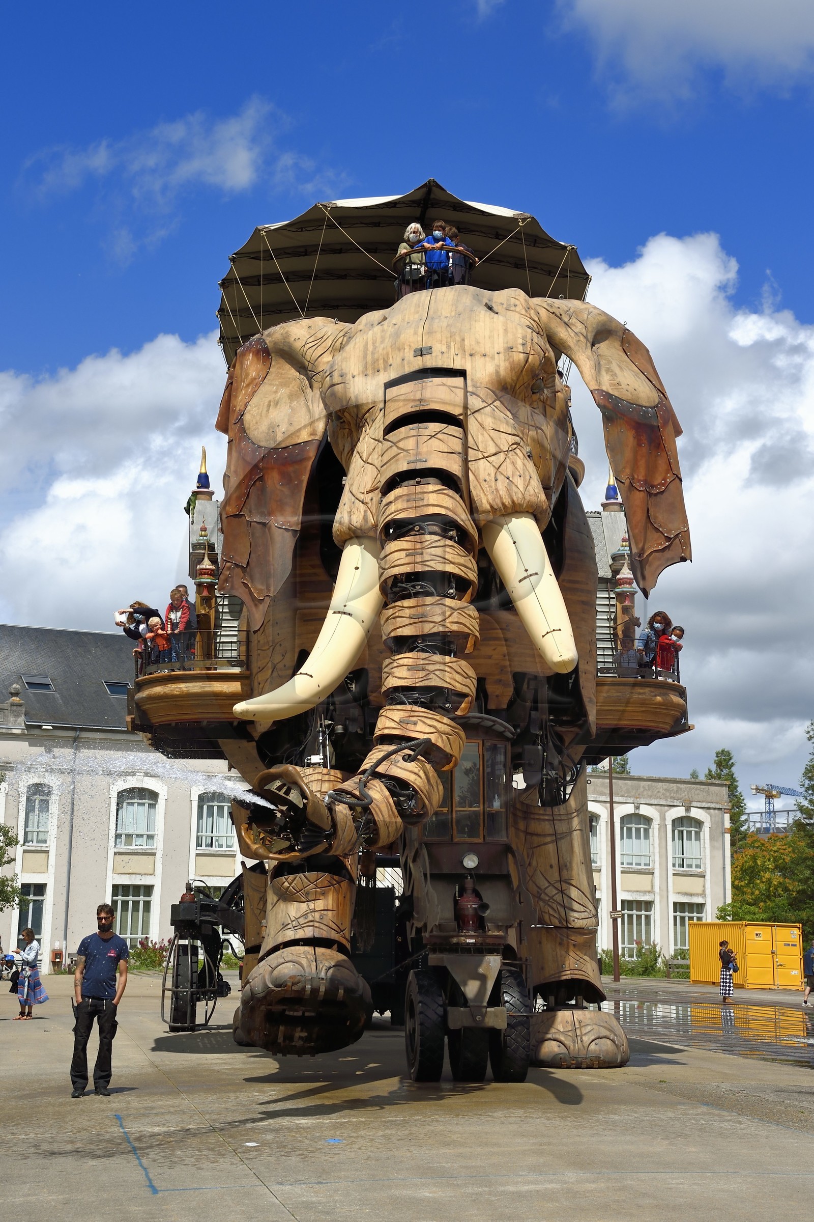 France, Loire-Atlantique, Nantes, Les Machines de l'Ile, an artistic project created by François Delaroziere and Pierre Orefice, the Big Elephant and the hangars of the former shipyards in the background