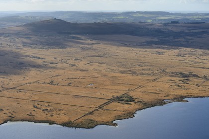 France, Finistere, Parc Naturel Regional d'Armorique (Armorica Regional Natural Park), Monts d'Arree, Brasparts, the Saint-Michel reservoir and  the Saint Michel chapel at the top of Menez Mikael in the background (aerial view)