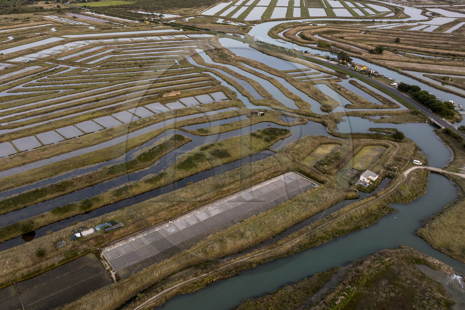 France, Charente-Maritime (17), Ile d'Oléron, Saint-Georges-d'Oléron, les marais salants Cabane O’Sel du saunier Samuel Barbereau (vue aérienne)