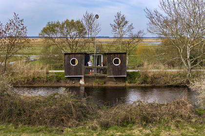 France, Loire-Atlantique, Parc Naturel Regional de la Briere (Briere Natural Regional Park), Saint Malo de Guersac,   cabin cottage The Twin Fisheries (aerial view)