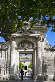 France, Gard, Villeneuve les Avignon, the Charterhouse of Val de Benediction, the monumental portal built by the architect François de Royers de la Valfenière in 1649 and Fort Saint André far in the background
