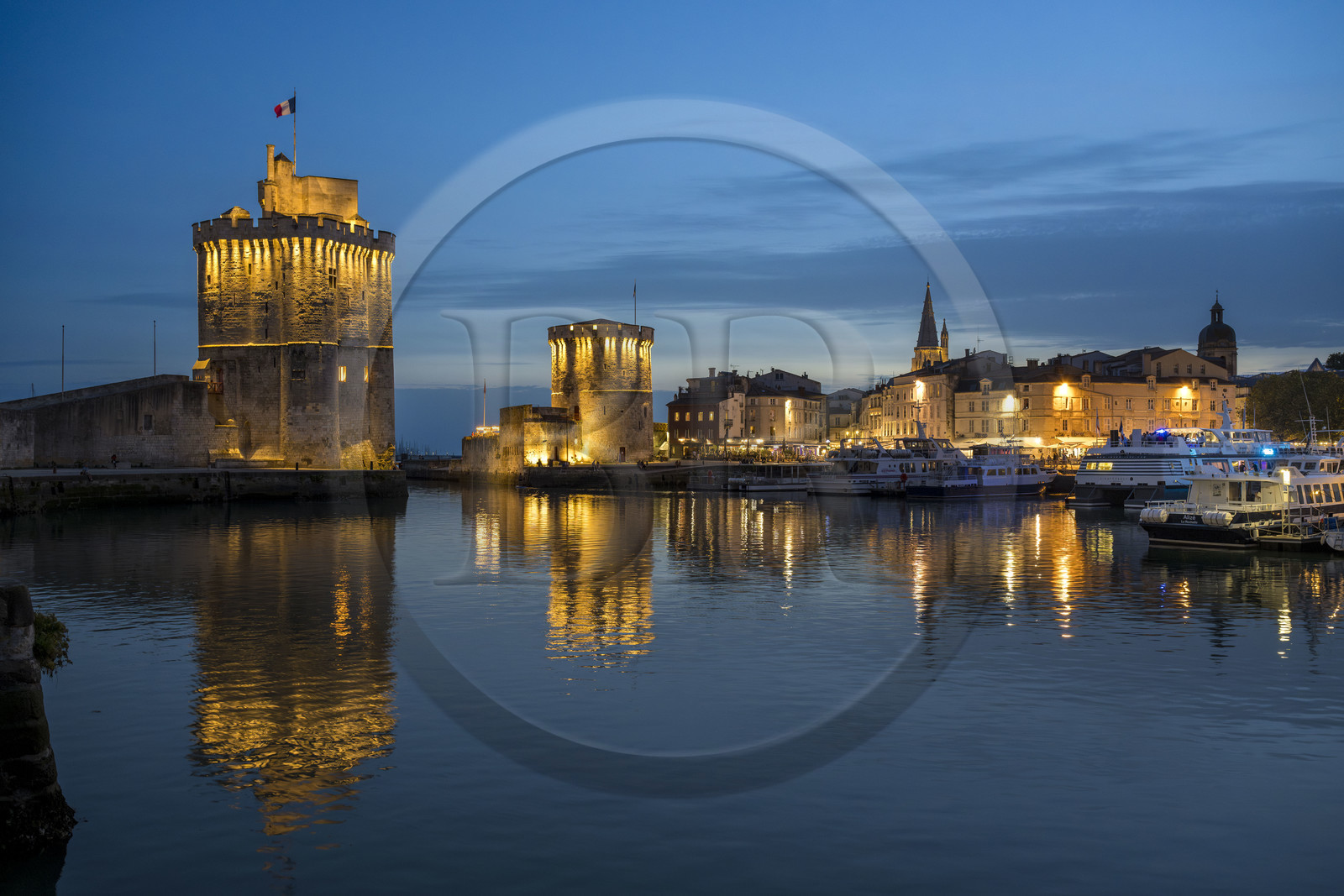 France, Charente Maritime, La Rochelle, the Old Port, Tour Saint Nicolas and Tour de la Chaine protect the entrance to the Old Port, the tour de la Lanterne in the background