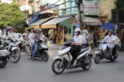 Vietnam, Hanoi, motorcycle traffic in the old city