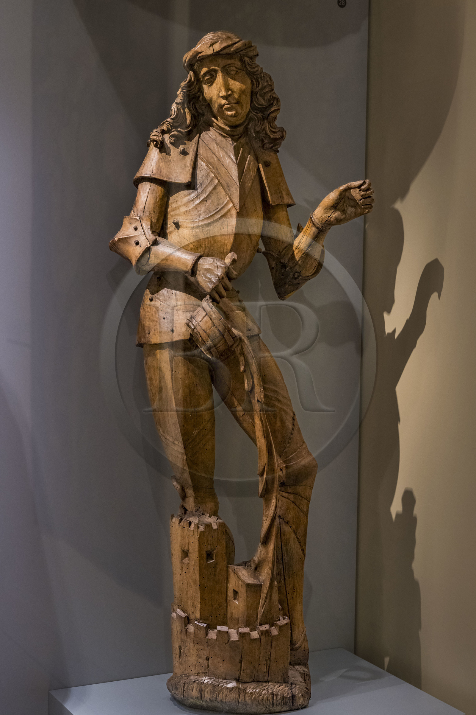 France, Paris, Musée de Cluny - Musée national du Moyen-Age (Middle Ages Museum in the former Hotel de Cluny), Saint Florian of Lorch, Austria c.1510, clad in figured armor extinguishing a fire, wood