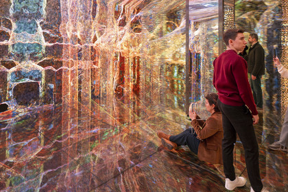 Spain, Catalonia, Barcelona, Eixample district, Passeig de Gracia, Casa Batllo by Catalan modernist architect Antoni Gaudi, UNESCO World Heritage site, In the Mind of Gaudi in the Gaudi Cube, a real 360º experience by new media artist Refik Anadol