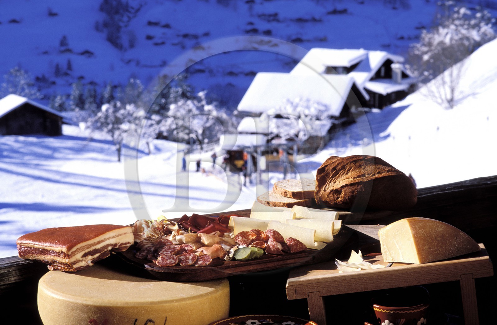 Switzerland, Bern Region (Bernese Oberland), Swiss cheeses on a terrace in Grindelwald
