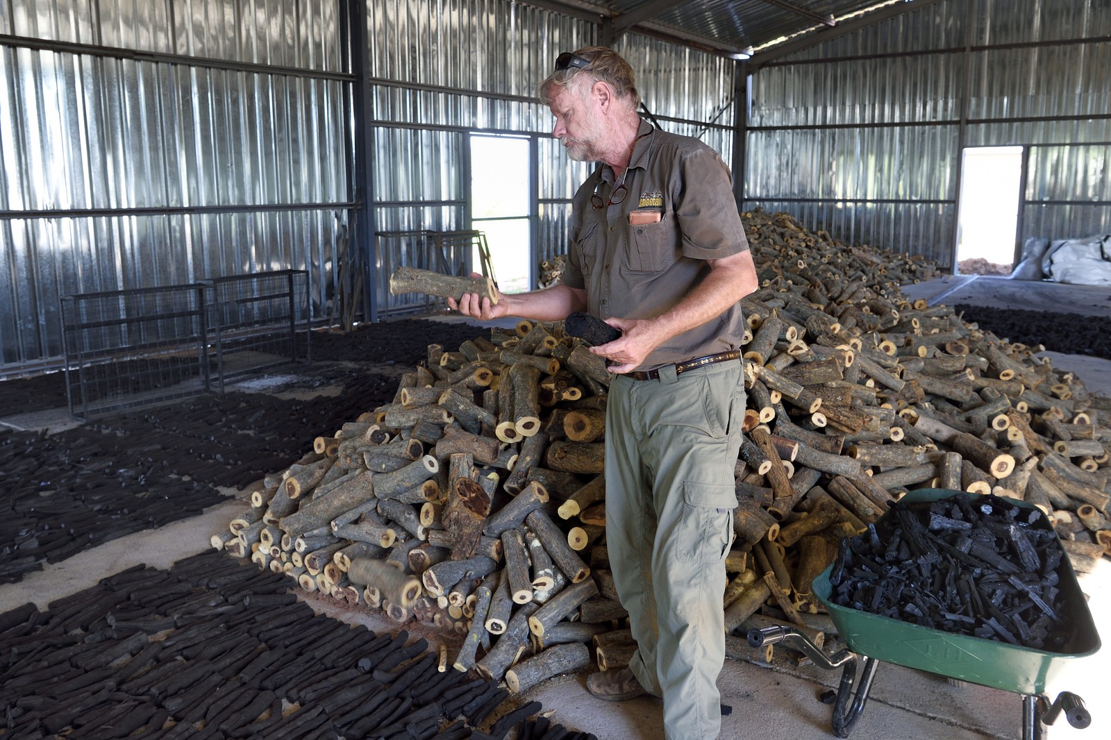 Namibia, Otjiwarongo, Cheetah Conservation Fund, research and education centre, CCF BUSH Pty Ltd manufactures wood fuel briquettes as a pilot project to explore a strategy to improve habitat for cheetah by removal of thickened bush, Bruce Brewer PhD. General Manager and also runs the CCF Bushblok project