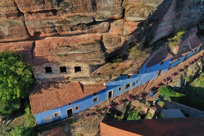 France, Bas Rhin, Parc regional des Vosges du nord (Northern Vosges Regional Natural Park), Eschbourg, Maisons des Rochers (Rocks houses) of Graufthal, semi-troglodytic houses of the 18th century and inhabited until 1958 (aerial view)