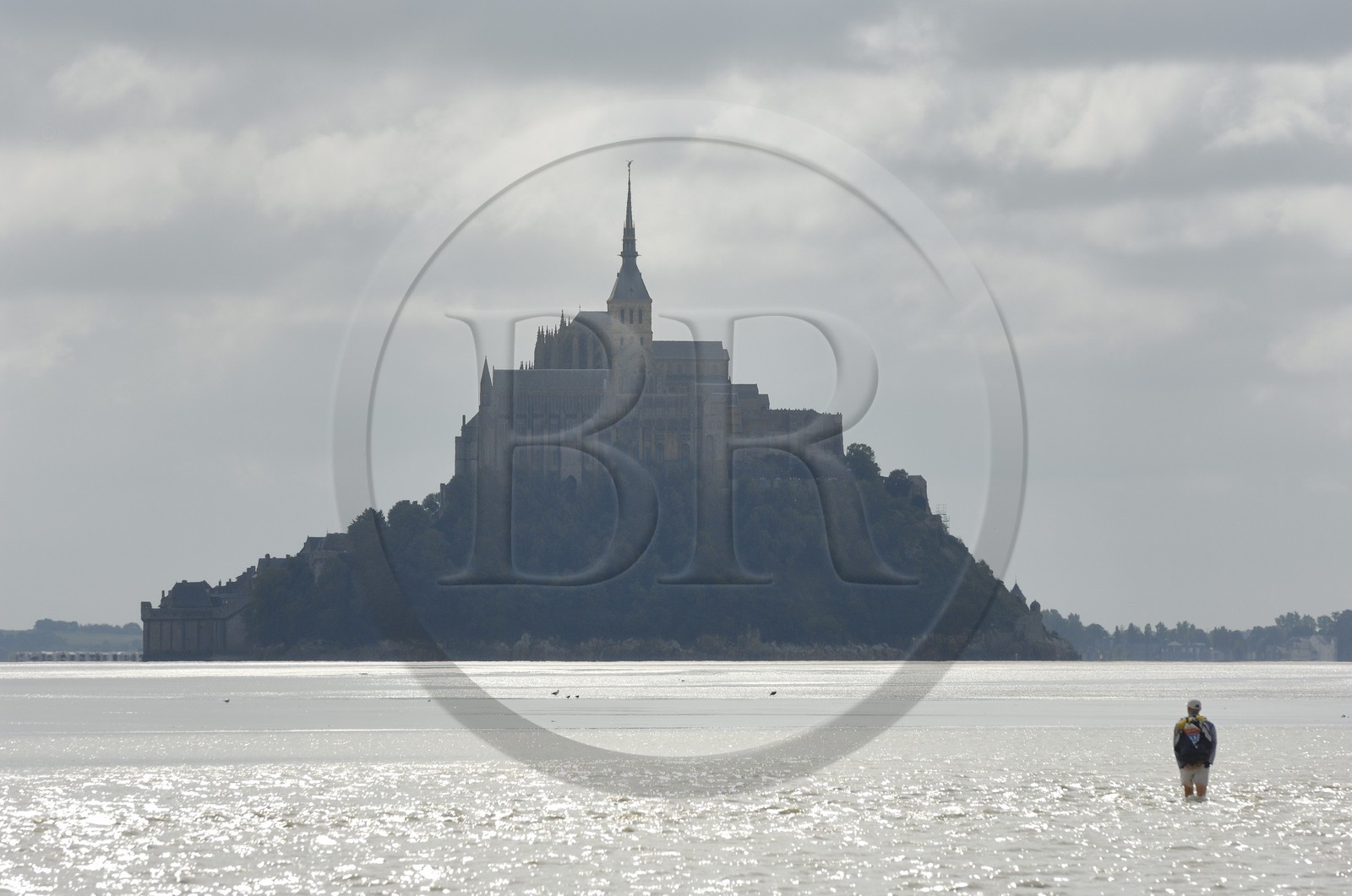 France, Manche, crossing on foot the Bay of Mont Saint Michel, listed as World Heritage by UNESCO