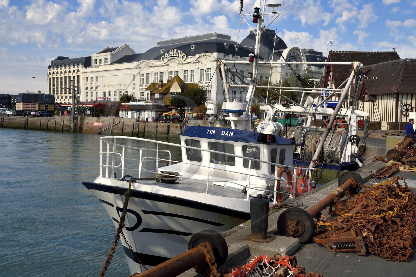 France, Calvados, Pays d'Auge, Trouville sur Mer, the port on the banks of the river Touques and the casino in the background