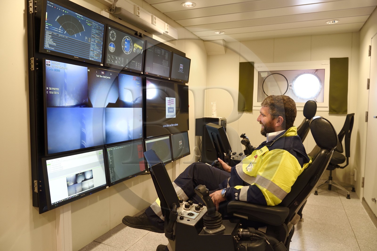 Norway, Ostfold County, Halden, Nexans Aurora cable-laying vessel, Magnus Bochman in the remote control center of the ROV (Remotely Operated Vehicle) submarine robot which allows the implementation of complete solutions for the protection of cables such as the digging of trenches