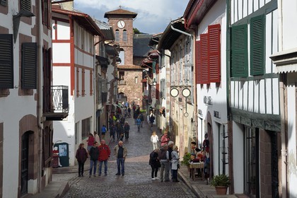 France, Pyrenees Atlantiques, Basque Country, Saint Jean Pied de Port, rue d'Espagne (Spain street) on the Way of St. James and Notre Dame du Bout du Pont church