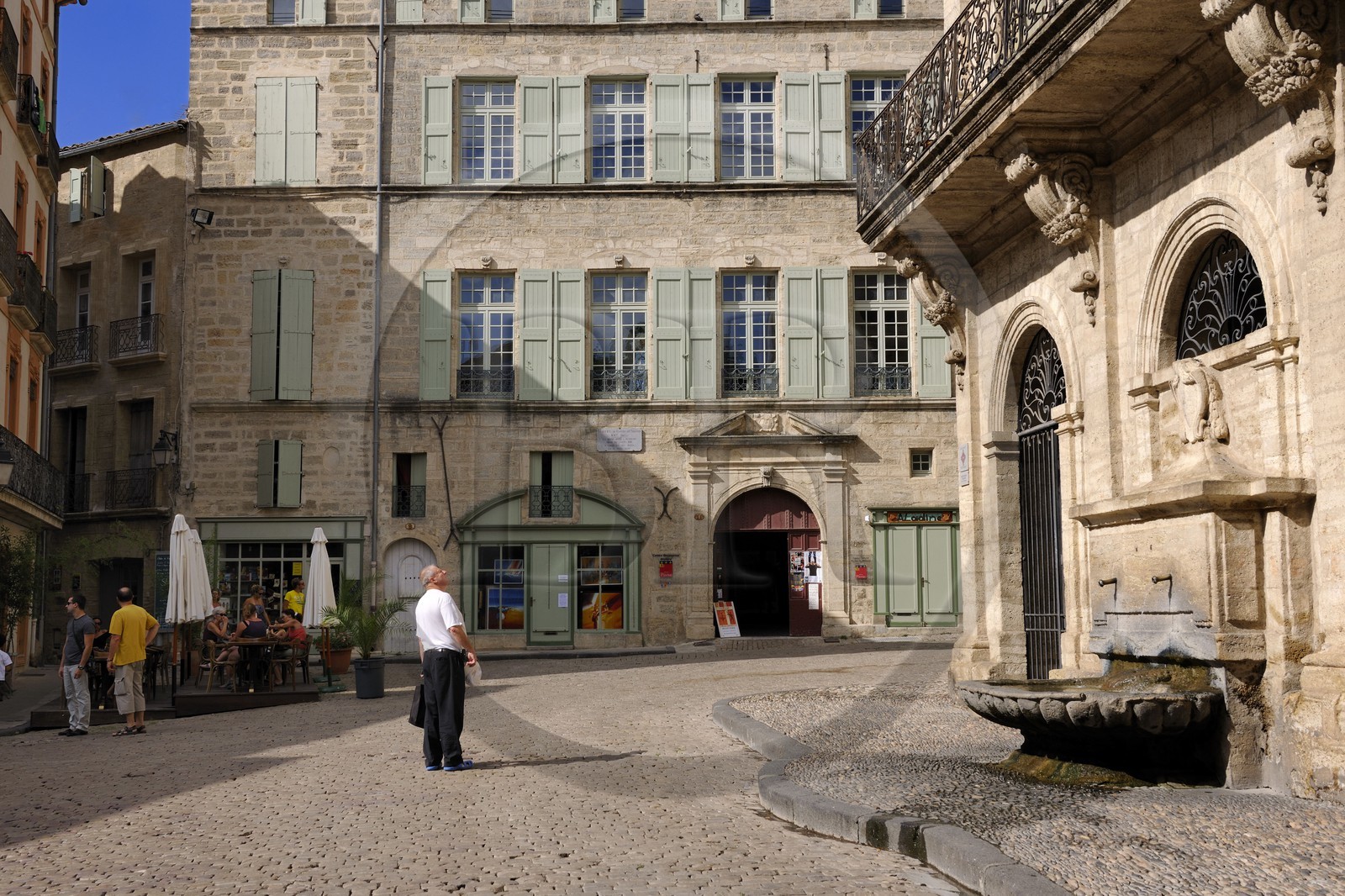 France, Herault, Pezenas, fountain of the Hotel des Consuls place Gambetta now home for arts and crafts on the right and Hotel Flottes de Sébasan at the back