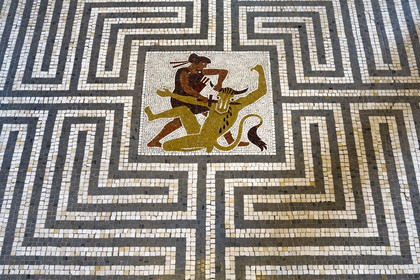 France, Alpes-Maritimes, Beaulieu-sur-Mer, neo-Greek style villa Kerylos build in 1908 by architect Emmanuel Pontremoli, the Andron or men's lounge, mosaic representing Theseus slaying the Minotaur in the center of the labyrinth
