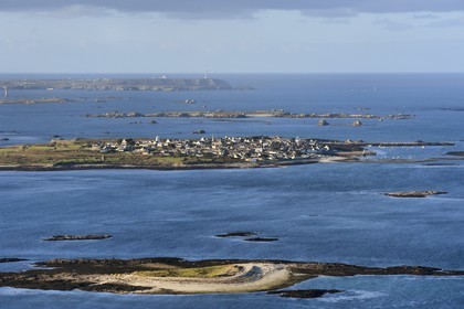 France, Finistere, the regional natural park of Armorica, Iroise sea, Molene island in the Molene archipelago and the island of Ouessant in the background (aerial view)