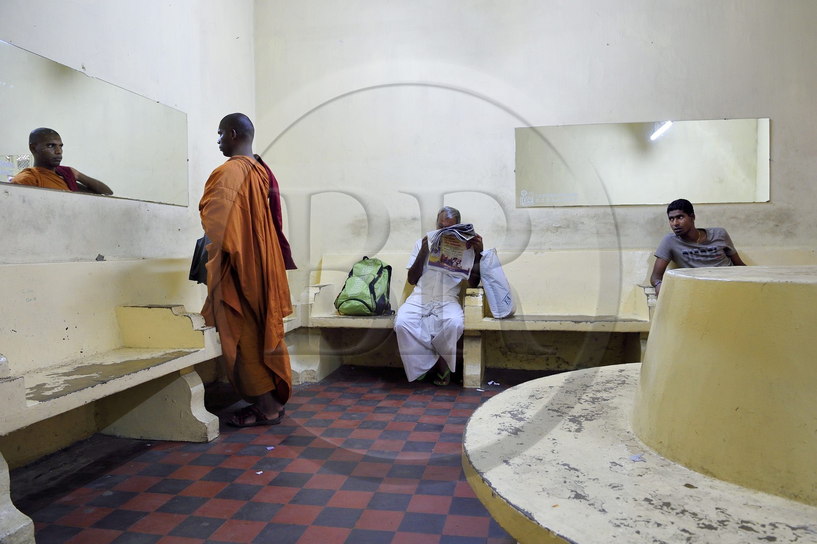 Sri Lanka, Colombo, central Colombo Fort train station, Buddhist monk in the waiting room