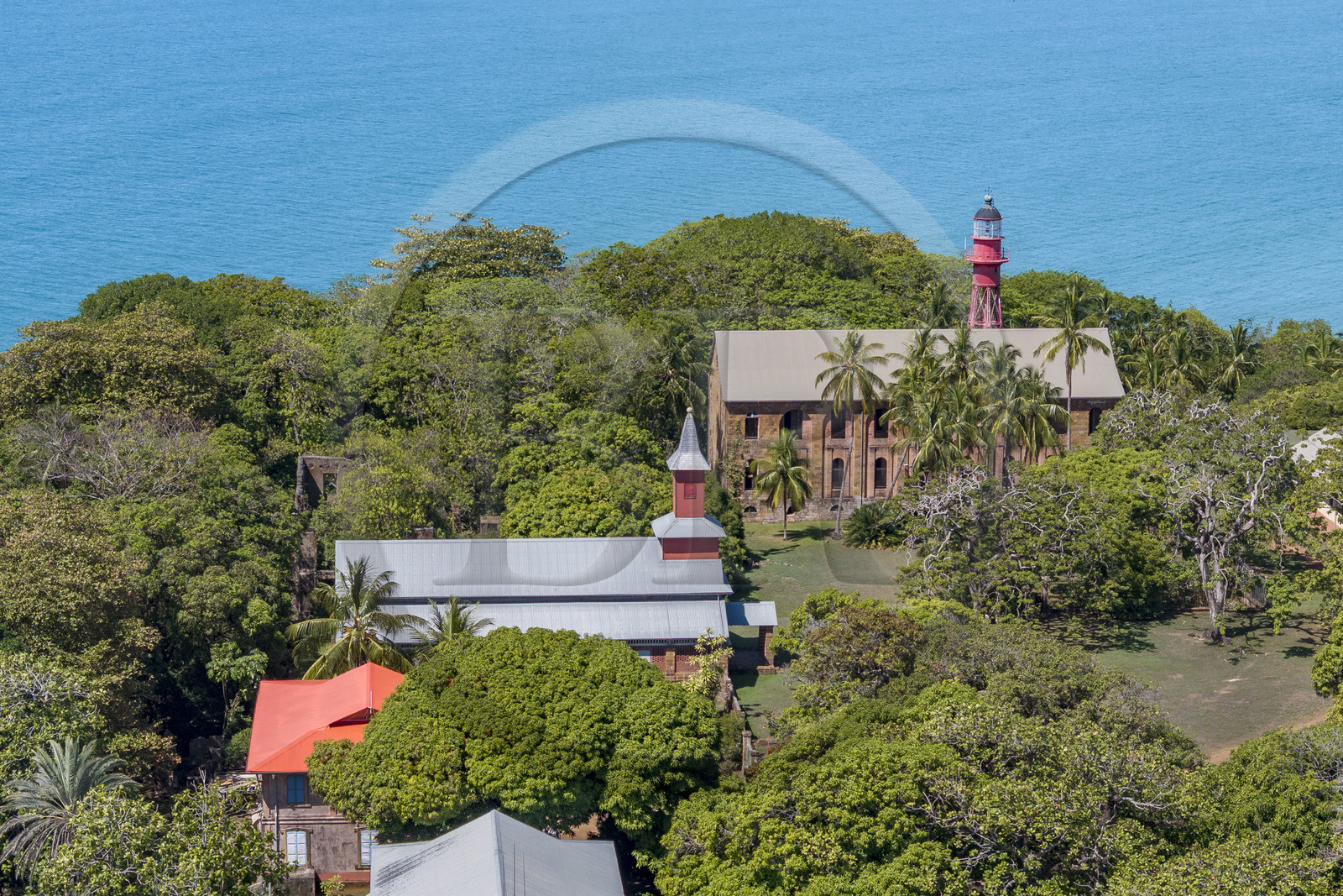France, French Guiana, Kourou, Salvation Islands (Iles du Salut), Royal Island, which housed the administration, chapel and hospital in the background of the penal colony (aerial view)