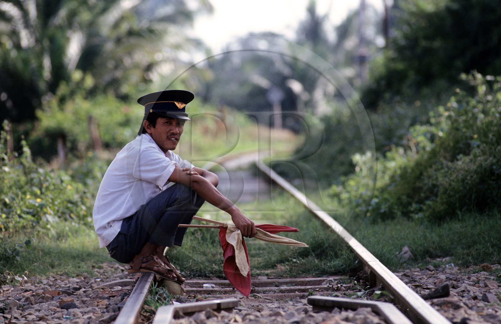 Vietnam, guard of grade crossing on the main railroad line going from Saïgon to Hanoi