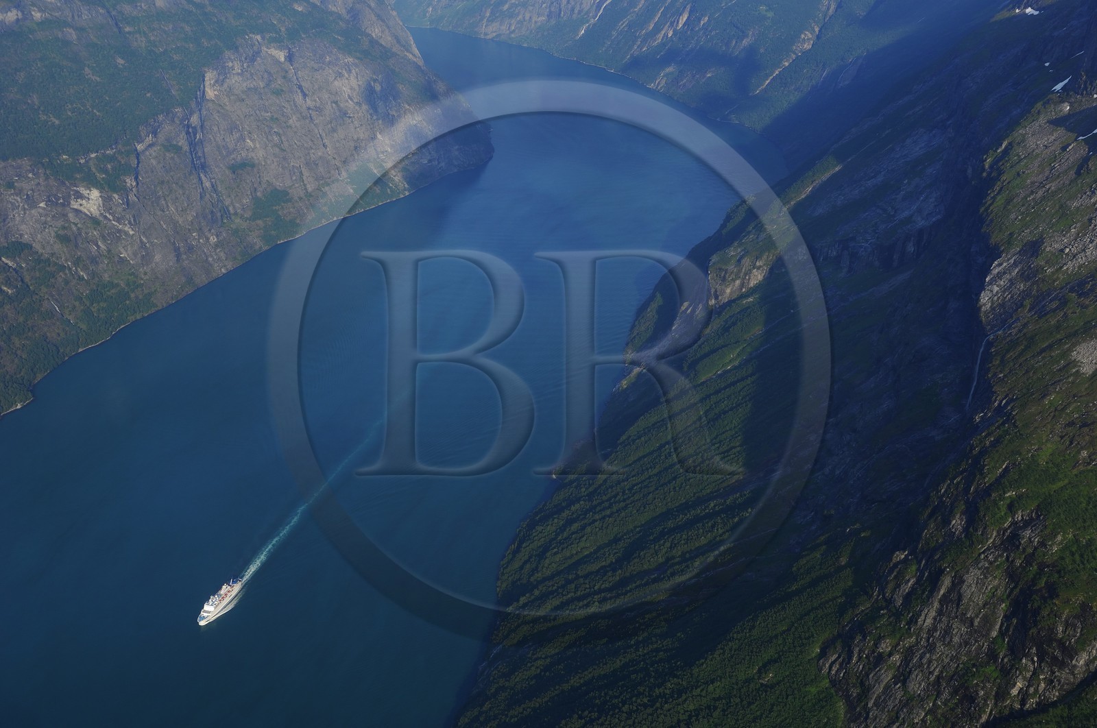 Norway, More Og Romsdal, cruise ship in the Geirangerfjord (aerial view)