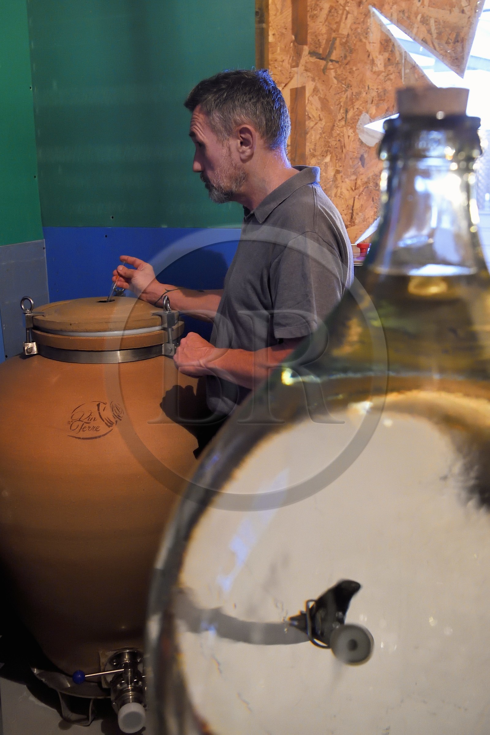 France, Reunion island (French overseas department), La Saline, Ludovic Maufras creator of La Part des Anges Distillation, 72 ° to 75 ° pink cane rum aged in terracotta amphora, rum made as a sugar cane eau de vie (brandy), alcohol weighing sample