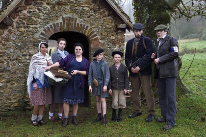 France, Eure, old wash-house of Sainte Colombe prés Vernon, Allied Reconstitution Group (US World War 2 and french Maquis historical reconstruction Association), the reenactors in partisans of the French Forces of the Interior (FFI) with their family