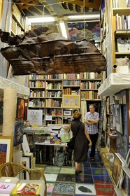 Italy, Lombardy, Milan, Vittorio Emmanuel II Gallery, Giacomo Lodetti manages the Libreria Bocca dating back to 1775