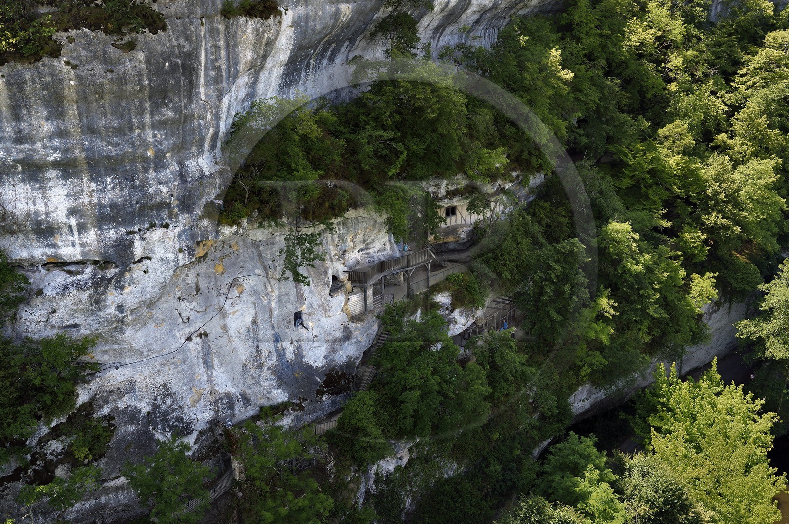 France, Dordogne, Perigord Noir, Vezere Valley, prehistoric site and decorated cave listed as World Heritage by UNESCO, Peyzac le Moustier, La Roque Saint Christophe Cliff, troglodytic site dating of the Prehistory, Rock shelters (aerial view)