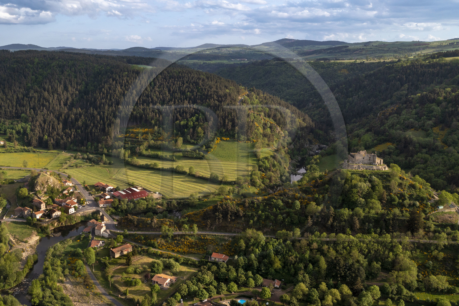 France, Haute-Loire (43), Goudet, Beaufort castle built around 1200 overlooks the Loire Valley and the village, hiking with a donkey on the Robert Louis Stevenson Trail (GR 70) (aerial view)