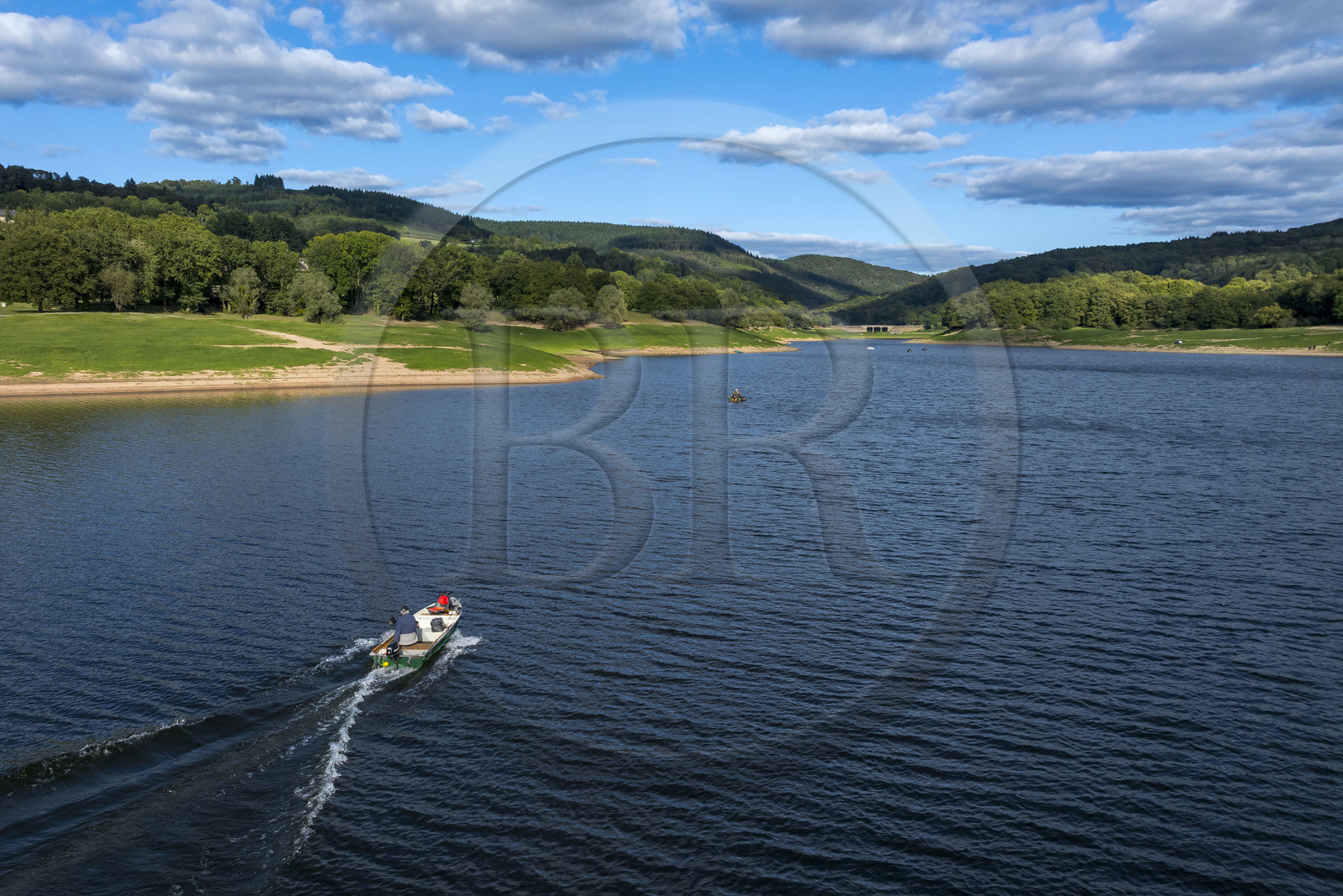France, Nievre, Regional Natural Park of Morvan, Chaumard, Pannecière lake, Jean-Bernard Dioux, vice-president of the AMC, the Morvan Carnassier Association, goes fishing on a boat (aerial view)