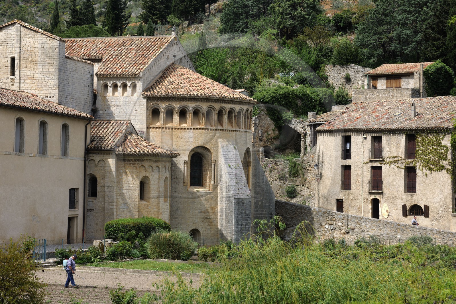 France, Herault, Medieval town of Saint-Guilhem-le-Desert, a stop on el Camino de Santiago, pilgrimage route to Compostela, labelled Les Plus Beaux Villages de France (The Most Beautiful Villages of France), abbey of Gellone from the 11th century listed as World Heritage by UNESCO, triple apse of the church