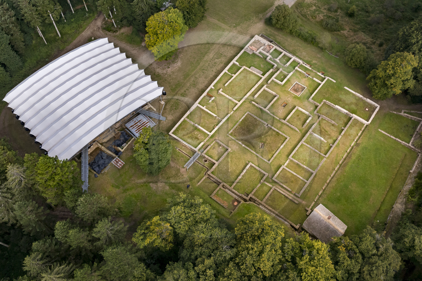 France, Saone et Loire, regional natural park of Morvan, Saint Leger sous Beuvray, oppidum of Bibracte, capital of the Celtic people of the Aedui, archaeological site on Mount Beuvray, ruins and excavation site of the Grande Domus du Parc aux Chevaux dating from the 1st century BC (aerial view)