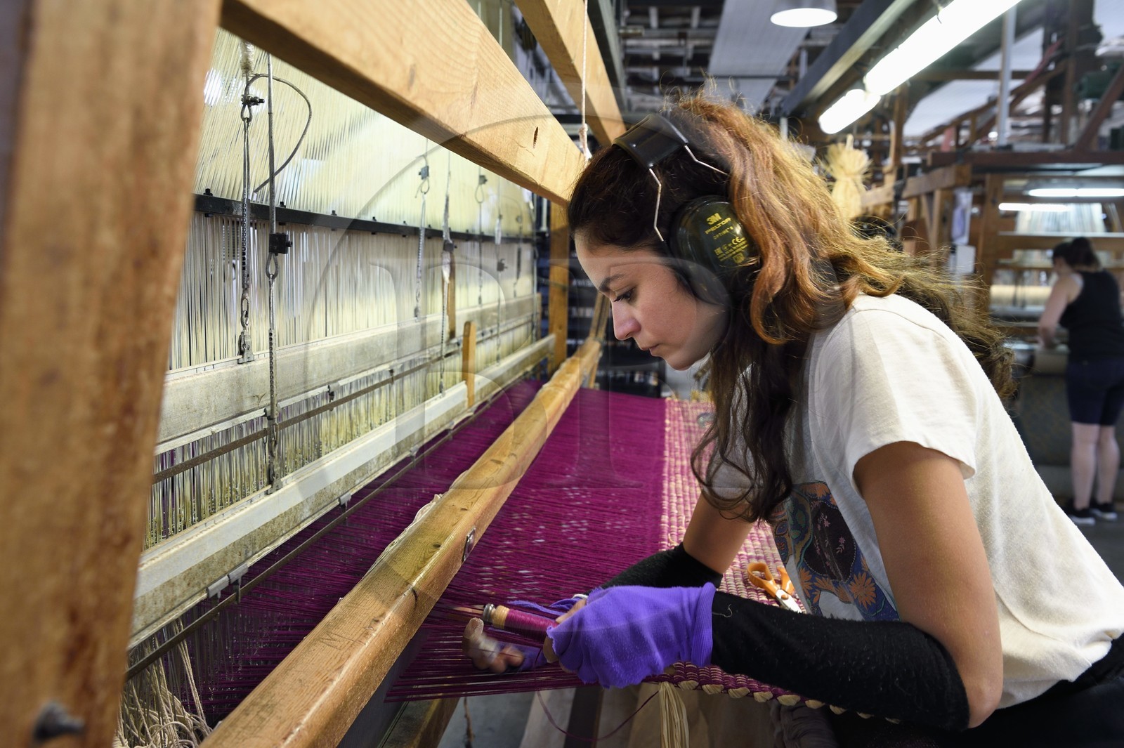 France, Var, Presqu'ile de Saint Tropez, Cogolin, the Manufacture Cogolin has been making rugs since 1924, most of them are woven by length on 19th century Jacquard hand looms, weaving raffia on a flat loom