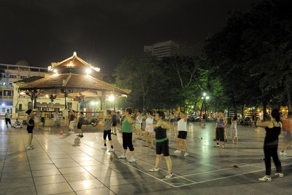 Vietnam, Hanoi, Ly Thai Tho square, people doing Tai chi