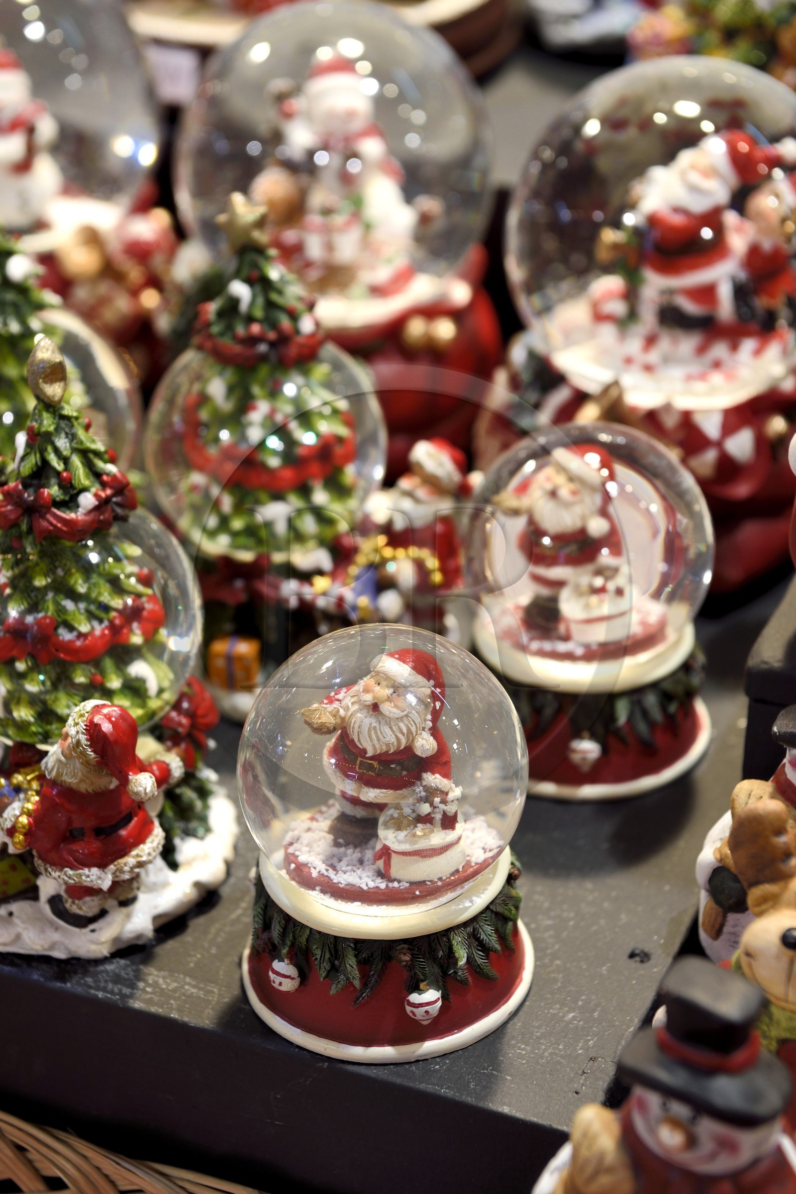 France, Bas Rhin, Strasbourg, old town listed as World Heritage by UNESCO, Christmas market (Christkindelsmarik) on the place Broglie, snow globe with Santa