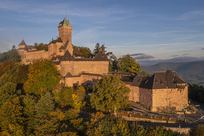 France, Bas Rhin, Orschwiller, Alsace Wine Road, the Haut Koenigsbourg Castle positioned on the Vosges foothills and overlooking the plain of Alsace to the east as well as the Villé and Bruche valleys to the west in the background (aerial view)