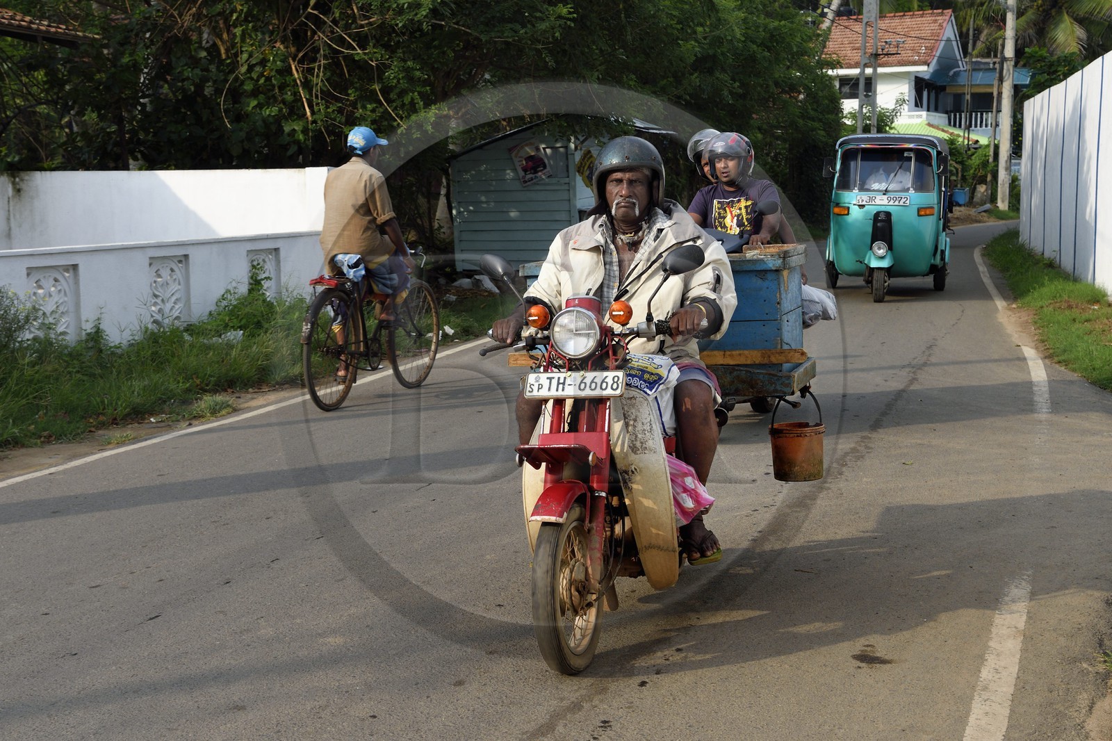 Sri Lanka, Southern Province, Matara district, Weligama, Mirissa Fisheries Harbor, fish buyers leave the port
