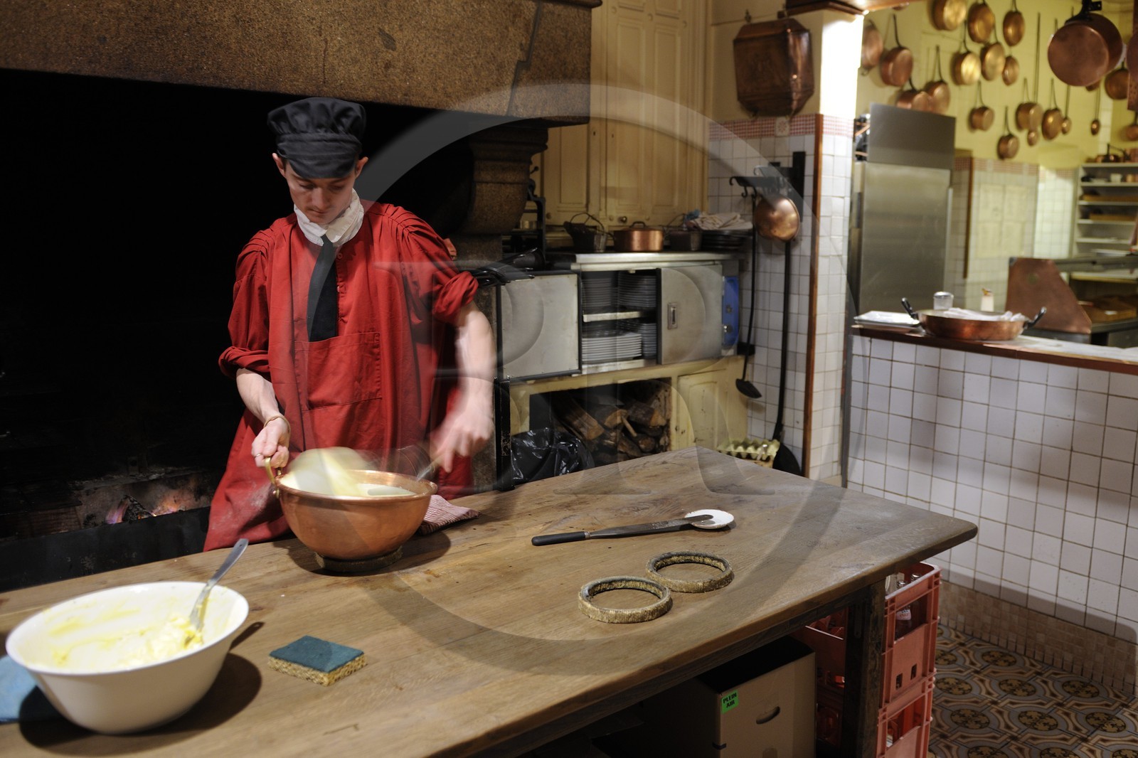 France, Manche, Mont Saint Michel, the restaurant called La Mere Poulard, preparation of the famous omelette