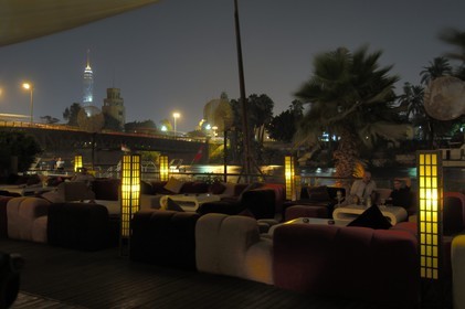 Egypt, Cairo, fashionable bar-restaurant of the Sheraton on the Nile side, and the Cairo Tower by architect Naoum Chebib in the background