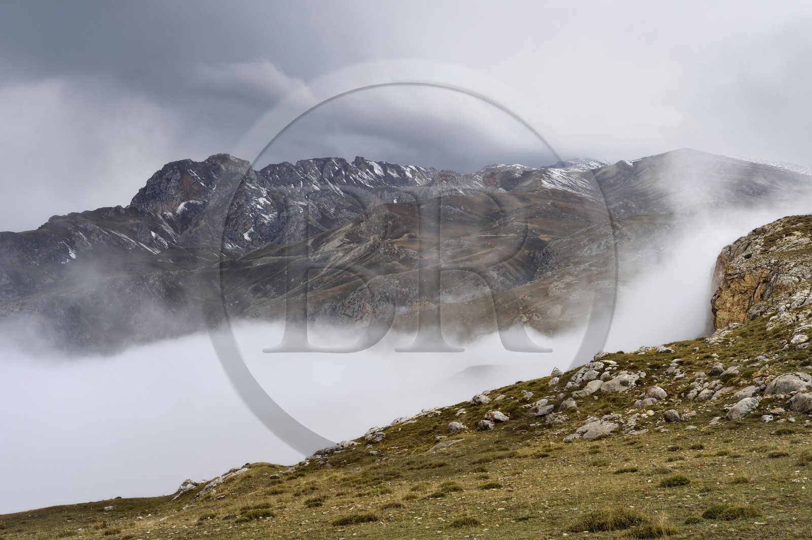 Azerbaijan, Quba (Guba) region, Greater Caucasus mountain range, summits in the clouds in the heights of the village of Giriz