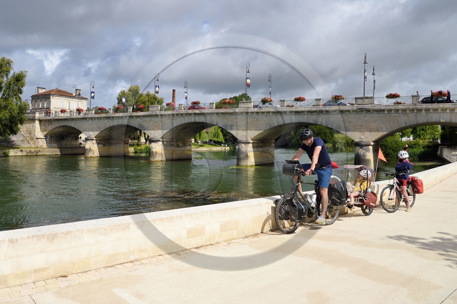 France, Charente, Cognac, the Porte Saint-Jacques, Hennessy cognac house and the quays of the Charente river