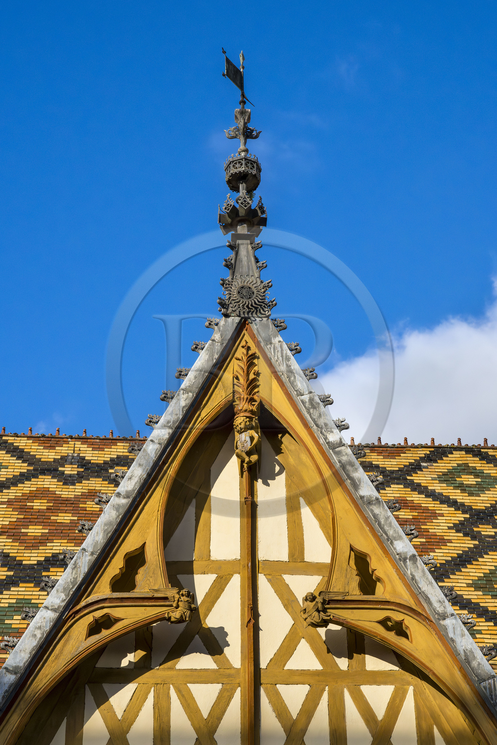 France, Cote d'Or, Beaune, area listed as World Heritage by UNESCO, Hospices de Beaune, Hotel Dieu, the roofs covered with glazed and colored tiles, dormer window detail