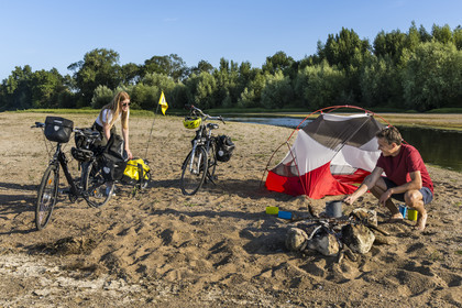 France, Maine-et-Loire, Loire valley listed as World Heritage by UNESCO, Saumur towards Saint-Hilaire, cycling along the banks of the Loire, setting up camp for the night on one of the sandbanks forming islands on the Loire