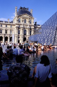 France, Paris, fountain of the Pyramid by the architect Ieoh Ming Pei and Louvre Museum