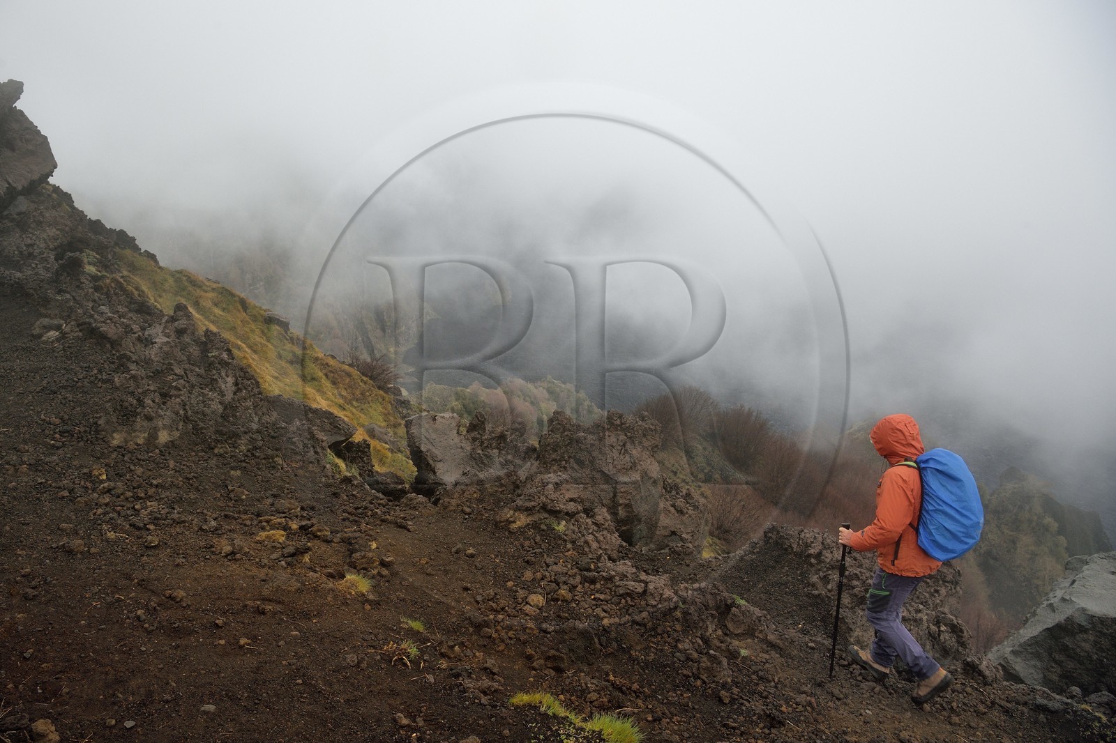 Italy, Sicily, Etna Regional Nature Park, Mount Etna, listed as World Heritage by UNESCO, hikers on the edge of the Valle del Bove which corresponds at a collapse of one of the walls of Mount Etna creating a field of volcanic rocks of 7 km by 6 km