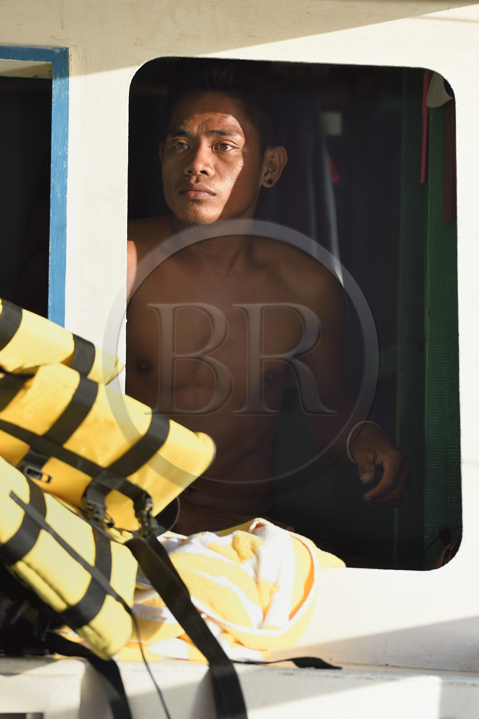 Philippines, Calamian Islands dans le nord de Palawan, baie de Coron, capitaine de pirogue à balancier