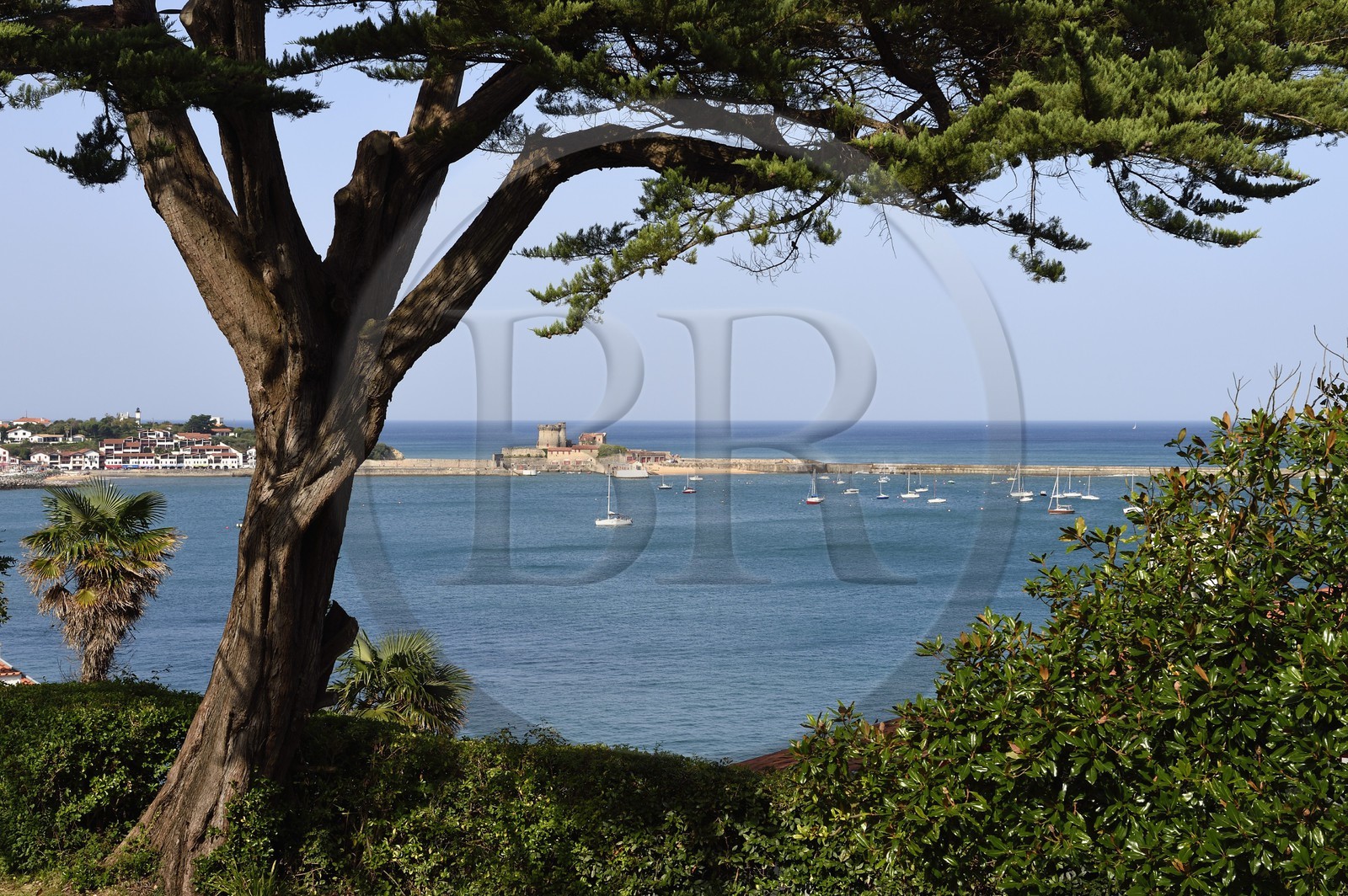 France, Pyrenees Atlantiques, Basque Country coast, Ciboure, the Villa Art Deco Leihorra, view from the garden on the Bay of Saint Jean de Luz and the Fort Socoa in the background