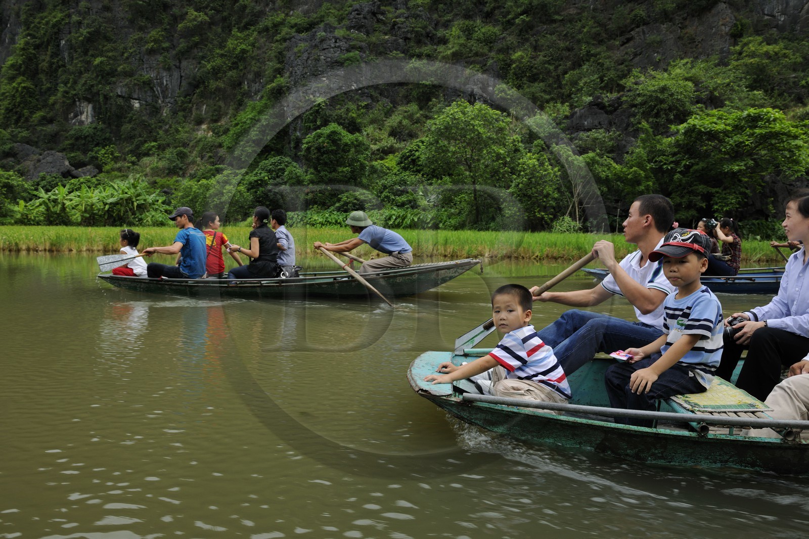 Vietnam, Ninh Binh province nicknamed Inland Halong Bay, small boat trip in Tam Coc surrounded by karstic moutains